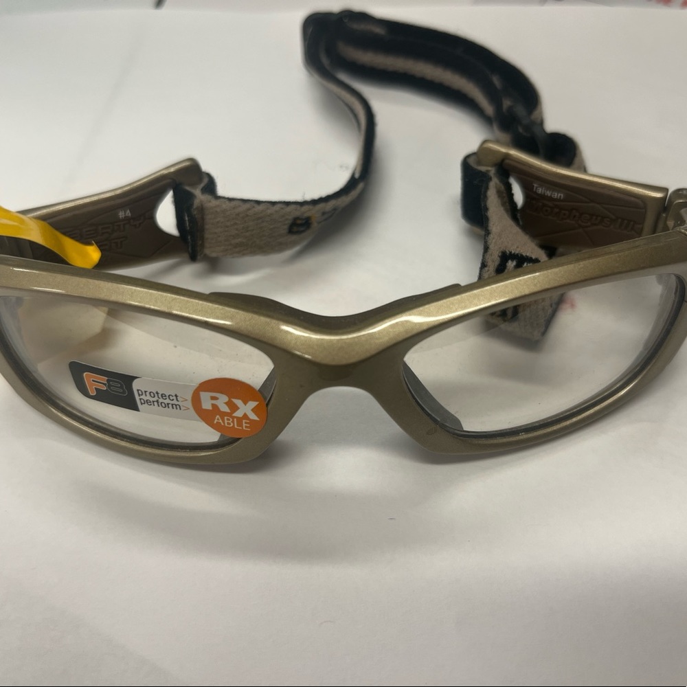 Kid safety frame with adjustable strap